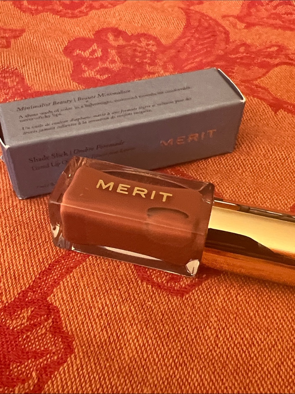 Merit- shade stick- Tinted Lip Oil in taupe